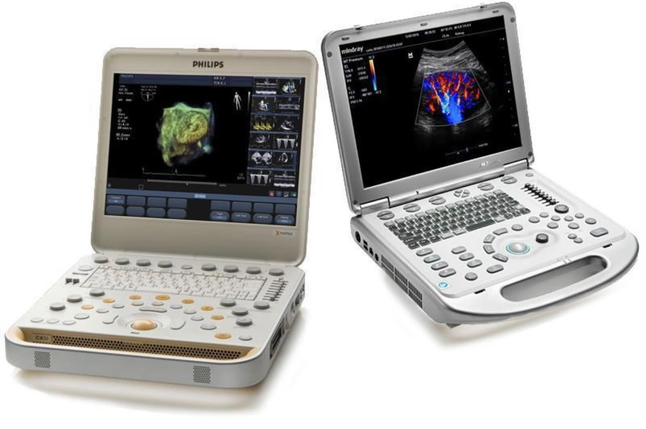 Two portable ultrasound systems with articulated displays and control keyboards, shown side by side against a white background.